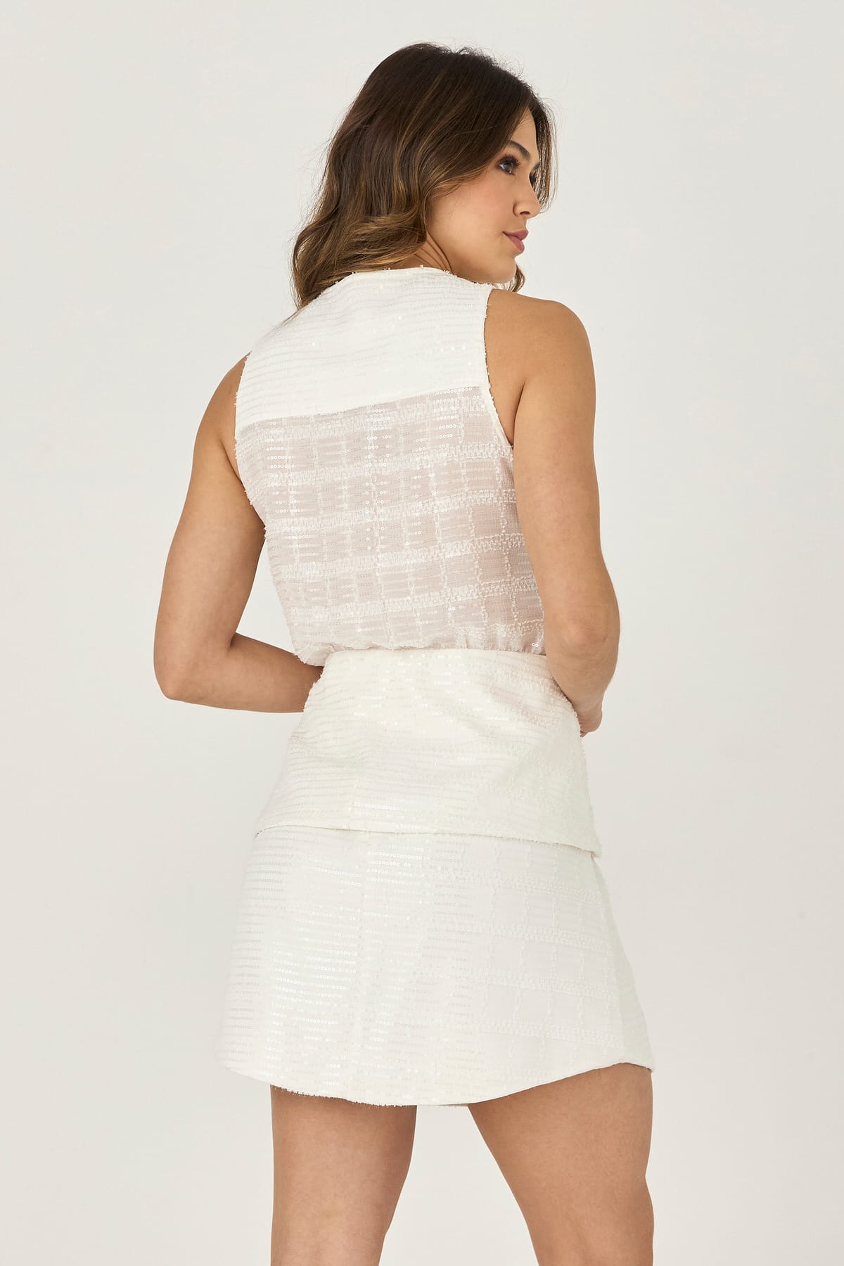 10160711 C BRAN Blusa Peplum Transparencia Paete